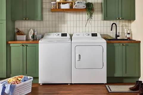 White Whirlpool electric dryer with a top-load matching design and Adaptive Dry technology
